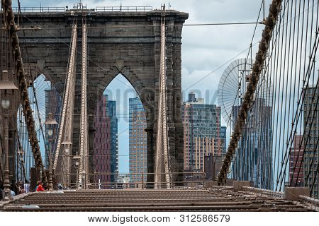 New York, Usa - June 21, 2019:   Historic And Iconic Brooklyn Bridge Arches With Metal Ropes.