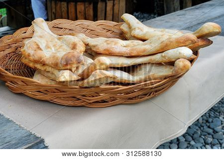 Stack Of Traditional Georgian Flat Breads In The Basket