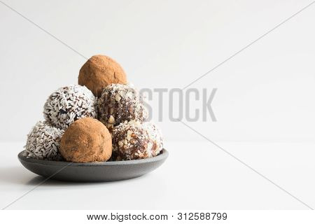Homemade Energy Balls With Cacao, Coconut. Healthy Food For Children And Vegan, Sweets Substitute.