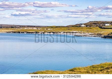 Houses, Vegetation And Beach