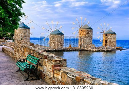 Traditional Greece series - windmills over sea in Chios island