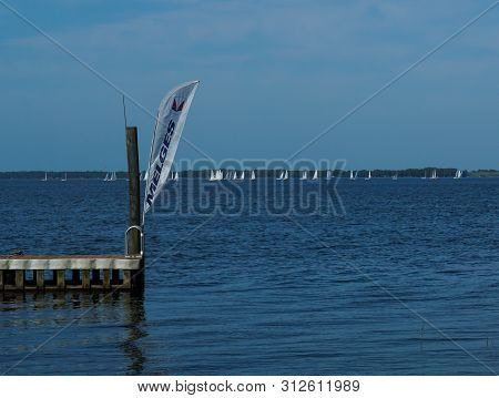 Lake Eustis, Fl/united States - 03/15/19 - Mc Scow Sailboats Made By Melges, Racing At A Sailing Yac