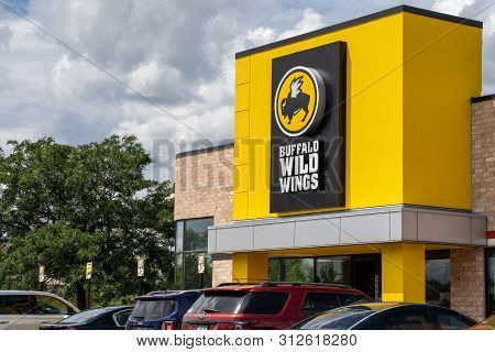 Crystal, Minnesota - July 21, 2019: Exterior Of A Buffalo Wild Wings Chain Restaurant. Also Known As