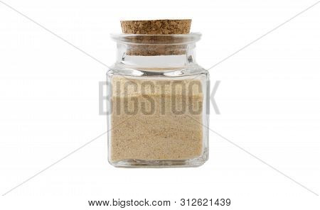 Dried Milled Ground Garlic In Glass  Jar On Isolated On White Background. Front View. Spices And Foo