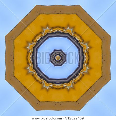 Abstract Emlem Made From Yellow Tractor Arm