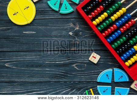 Creative Сolorful Math Fractions On Dark Background. Interesting Funny Math For Kids. Education, Bac