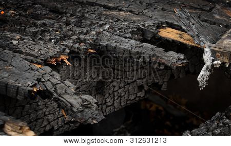 Deck Flooring And Joist After Being Burned In A House Fire