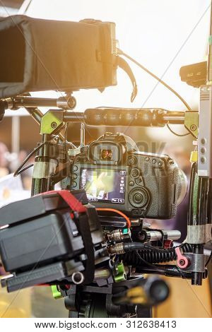 Behind The Scene. Cameraman Shooting Film Scene With Camera
