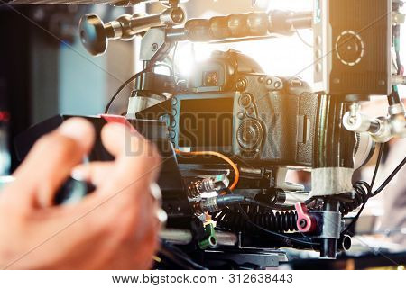 Behind The Scene. Cameraman Shooting Film Scene With Camera
