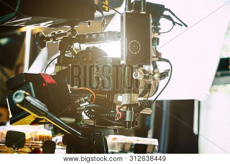Behind The Scene. Cameraman Shooting Film Scene With Camera