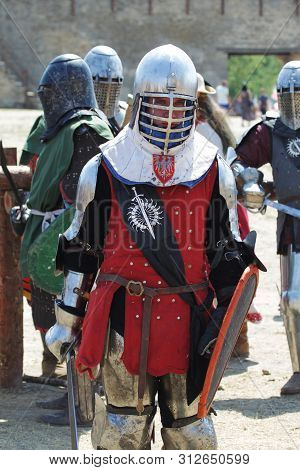 Odessa, Ukraine - July 20, 2019: Battle Of The Knights With Medieval Weapons At The Medieval Perform