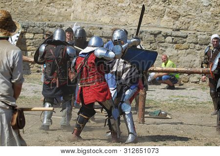 Odessa, Ukraine - July 20, 2019: Battle Of The Knights With Medieval Weapons At The Medieval Perform
