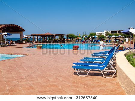 Malia. Crete, Greece - Juni 18, 2019: Swimming Pool At Luxury Hotel In Malia On Crete, Greece