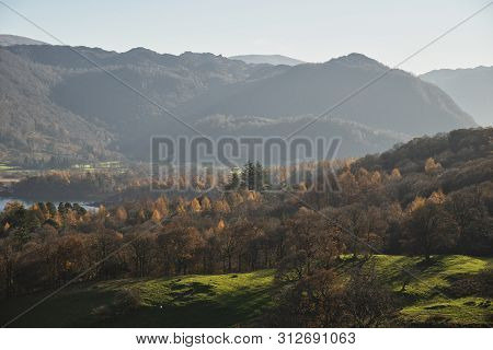 Stunning Autumn Fall Landscape Image Of The View From Catbells In The Lake District With Vibrant Fal