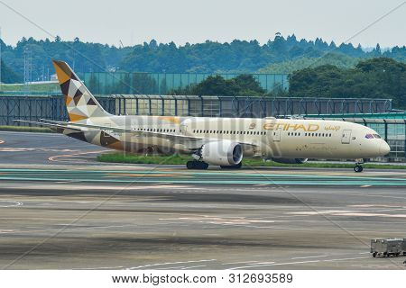 Passenger Airplane At Tokyo Narita Airport