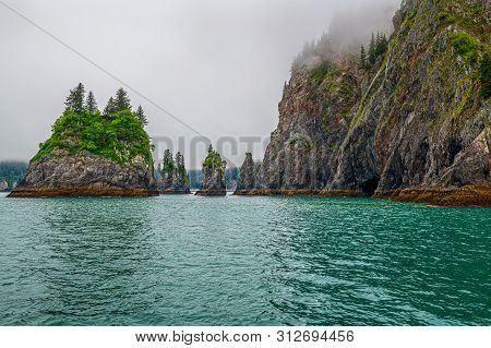 Rock Formations In Aialik Bay In Fjords National Park In Alaska.