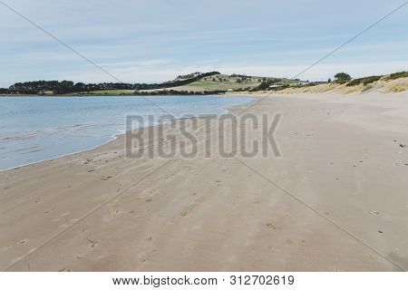 Sunny Australian Beach In Cremorne, Tasmania