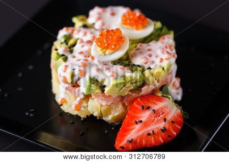 Round Salad Made Of Red Fish Potato And Avocado