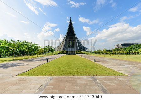 Nakhonpathom , Thailand - 18 Jul, 2019: Prince Mahidol Hall Building Of Mahidol University With Refl