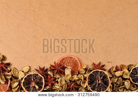 Autumn Background With Golden Leaves, Dried Fruts, Cinnamon And Anis. Space For Text Or Design.