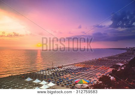 Durres, Albania. June 2019: Aerial View To Sandy Beach Full Of Umbrellas And People In Summer Season