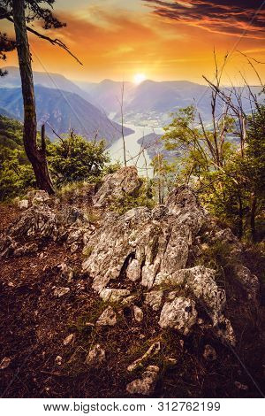 Sunset In Mountain Landscape. Mountain Layers In Sunset. Sunset In The Mountain River Landscape. Riv