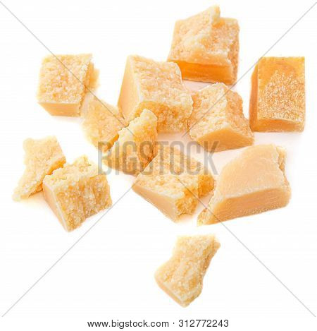 Pieces Of Parmesan Cheese Isolated On A White Background Close Up, Top View