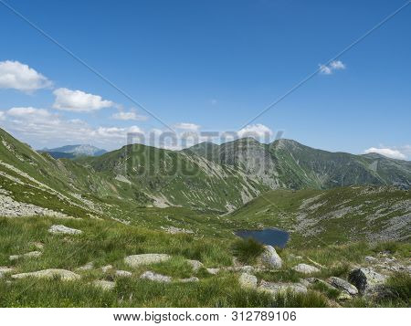 Beautiful Vivid Blue Mountain Lake Horne Jamnicke Pleso With Green Mountain Peaks View From The Jamn