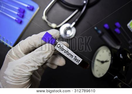 Chloroform Test Text With Blood Sample. Top View Isolated On Black Background. Healthcare/medical Co