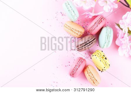 Colorful French Macarons On Pink Background With Copy Space, Traditioanal Dessert In France