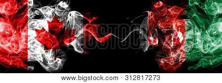 Canada Vs Afghanistan, Afghani Smoky Mystic Flags Placed Side By Side. Thick Colored Silky Smoke Fla