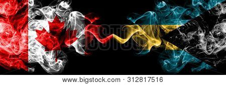 Canada Vs Bahamas, Bahamian Smoky Mystic Flags Placed Side By Side. Thick Colored Silky Smoke Flags 