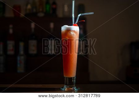 Delicious Cocktail On The Bar Counter Close Up. With A Cherry