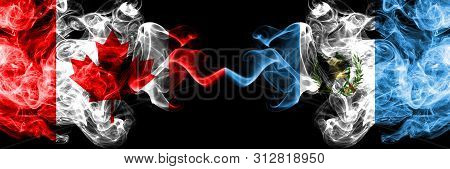 Canada Vs Guatemala, Guatemalan Smoky Mystic Flags Placed Side By Side. Thick Colored Silky Smoke Fl