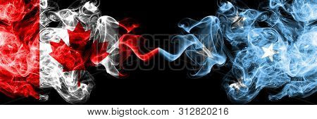 Canada Vs Micronesia, Micronesian Smoky Mystic Flags Placed Side By Side. Thick Colored Silky Smoke 