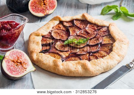Homemade Figs Galette Made With Fresh Organic Figs On Wooden Table