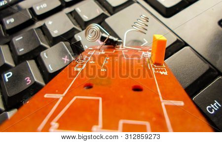 Red Electronic Board On The Keyboard. Repair Of Equipment. System Administrator.