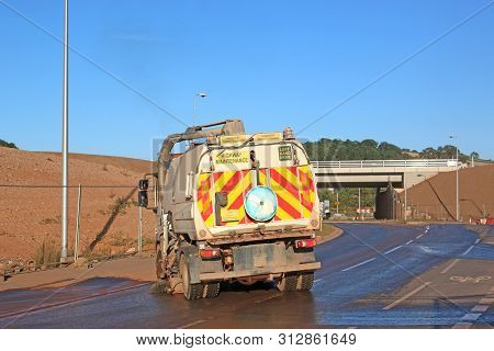Road Sweeper At Work On A Road Construction Site