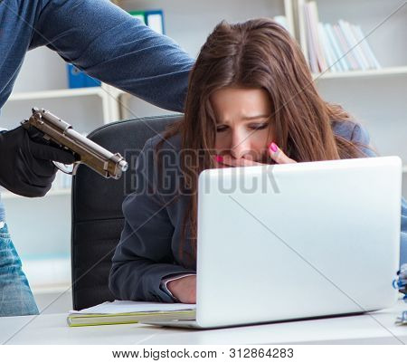 Criminal taking businesswoman as hostage in office