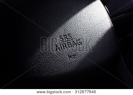 Srs Airbag Icon On Steering Wheel In A Car.