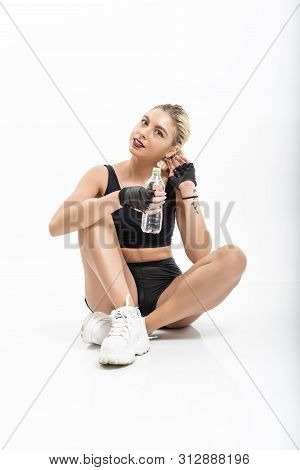 Woman After Sport Drinking Water From Bottle