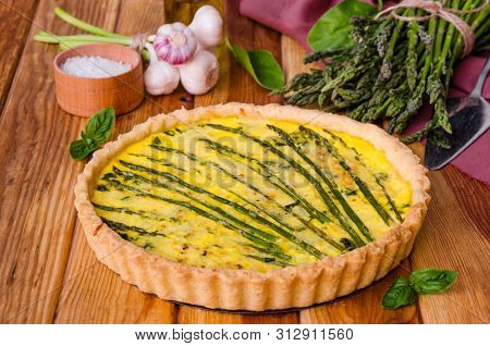 Traditional French Tart With Asparagus, Spinach And Cheese. Delicious Tart For Lunch. Rustic Style.