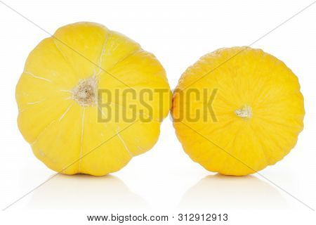 Group Of Two Whole Ribbed Fresh Yellow Melon Canary Isolated On White Background