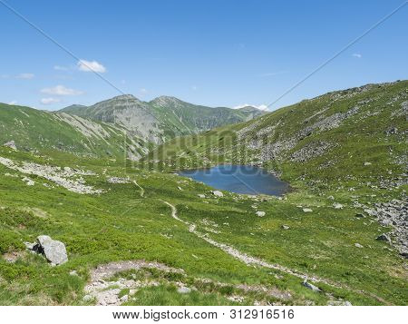 Beautiful Vivid Blue Mountain Lake Horne Jamnicke Pleso With Green Mountain Peaks View From The Jamn