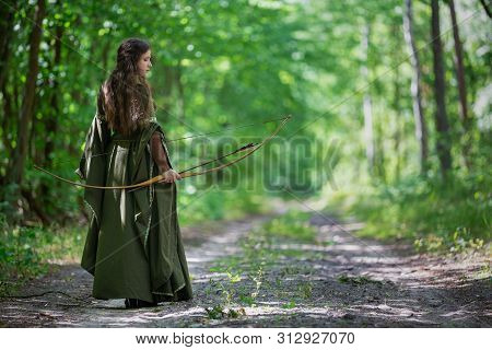 Elf Archer From Behind In The Woods