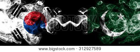 South Korea Vs Pakistan, Pakistani Smoky Mystic Flags Placed Side By Side. Thick Colored Silky Abstr