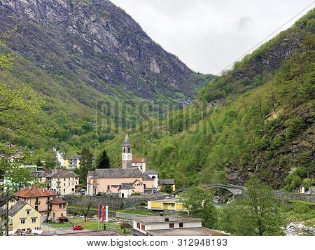 The Village Of Bignasco On The River Maggia And In The Maggia Valley Or Valle Maggia Or Maggiatal, B
