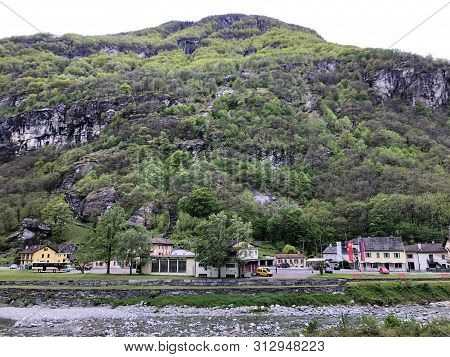 The Village Of Bignasco On The River Maggia And In The Maggia Valley Or Valle Maggia Or Maggiatal, B