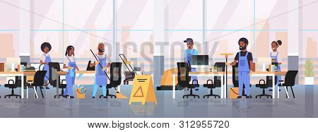 Cleaners Team In Uniform Working Together Cleaning Service Concept African American Janitors Using P