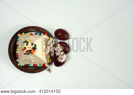 Easter Composition. Eggs, Apricot Flowers And Orthodox Easter Cottage Cheese Dessert In The Form Of 